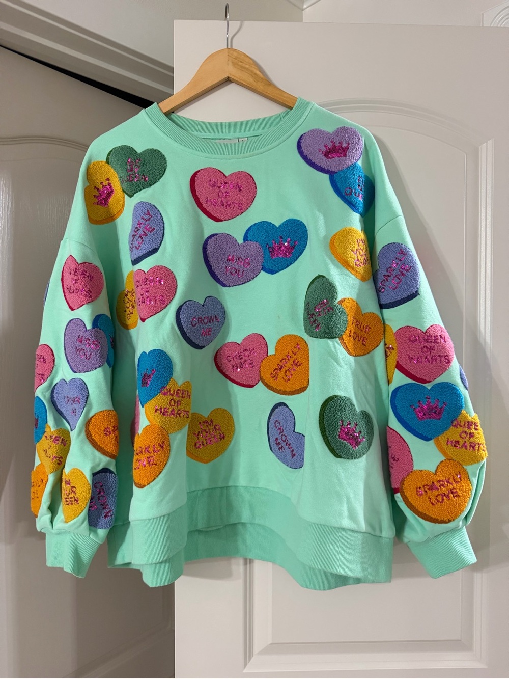 QUEEN OF SPARKLES Mint Sweater with Multicolor Heart Appliqués